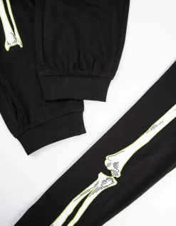 Pyjamaset bestaande uit shirt met lange mouwen en broek - Gloeit in het donker - zwart